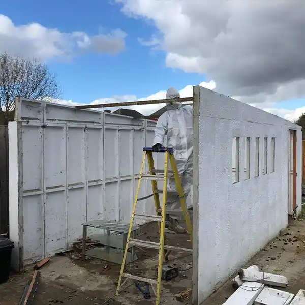 asbestos garage roof being removed